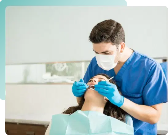 Dentist working on patient